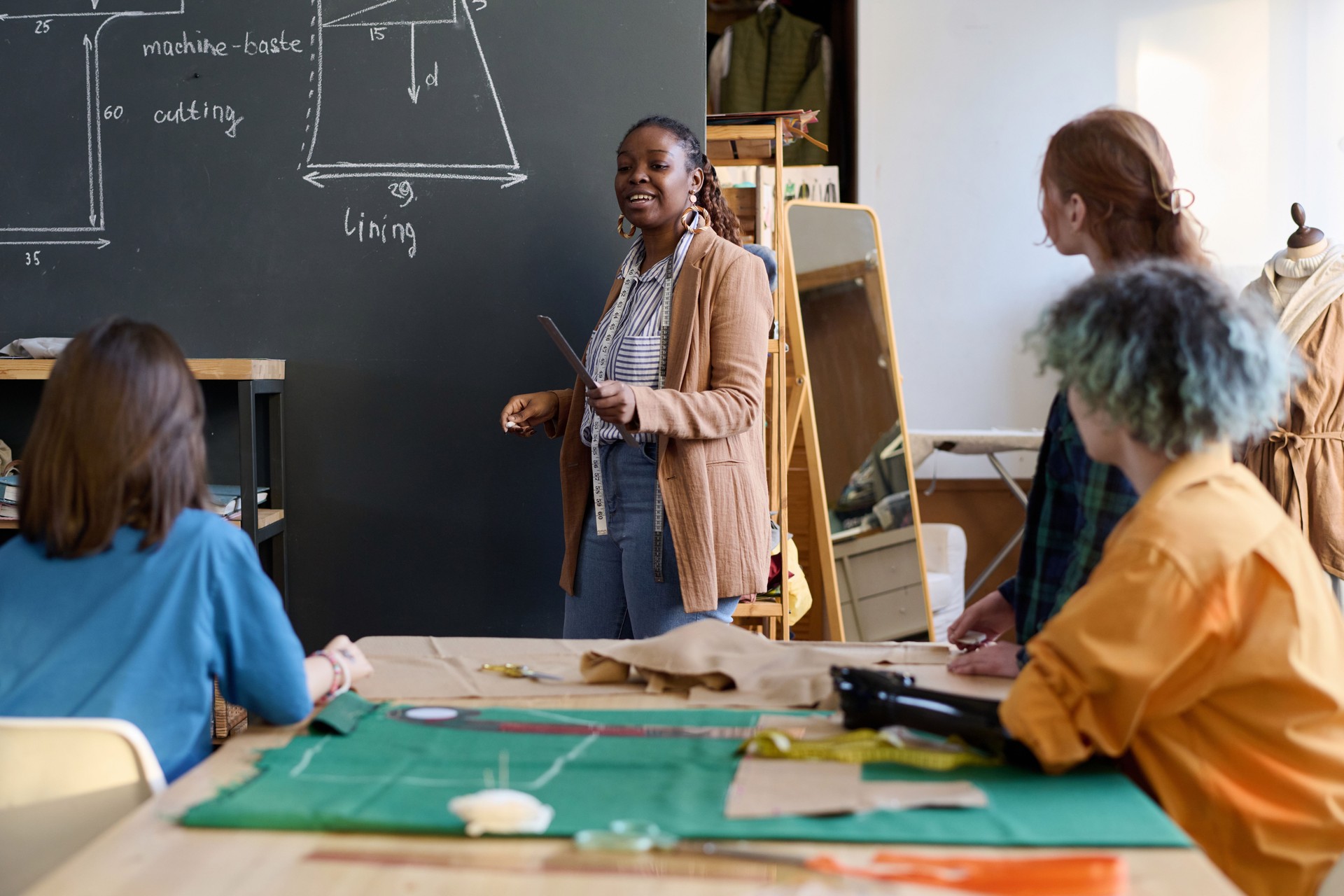 Female Teacher with Group of Girls in Atelier
